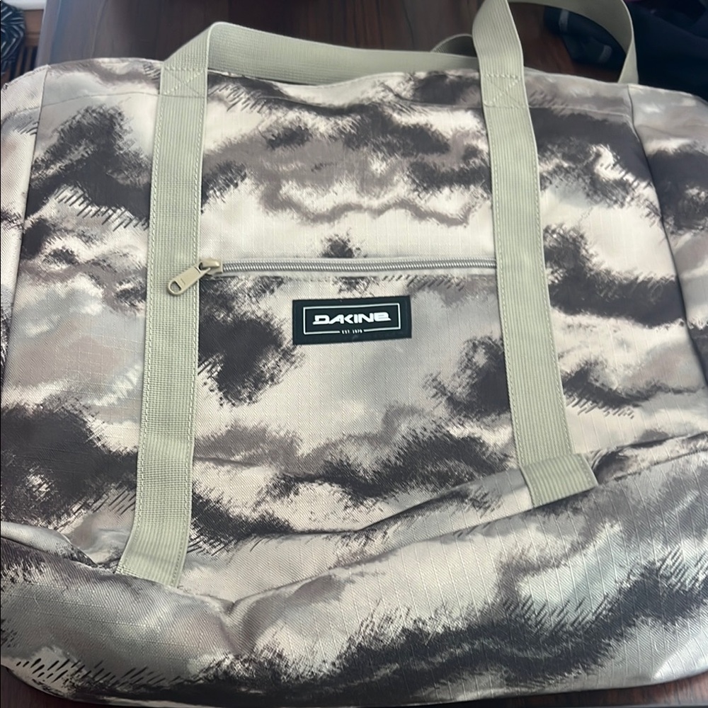 Dakine Gray and Tan Duffel Bag with Sturdy Design
